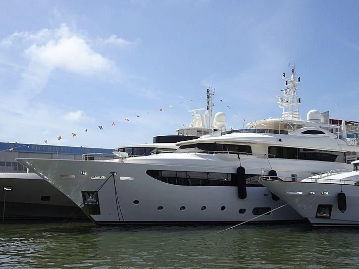 a couple of large white yachts aboard PALATIAL Yacht for Sale
