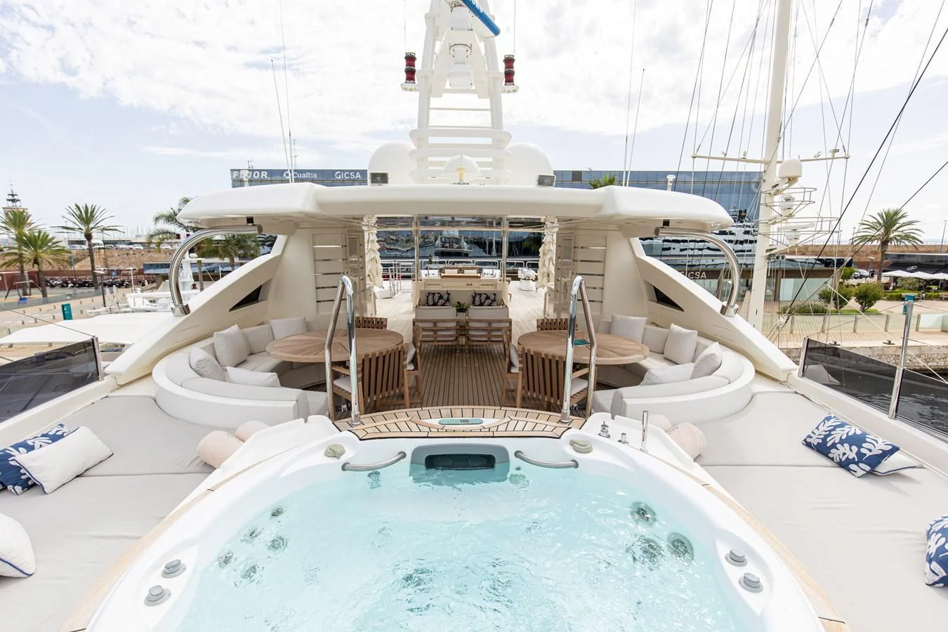 a large white boat with a pool aboard PALATIAL Yacht for Sale