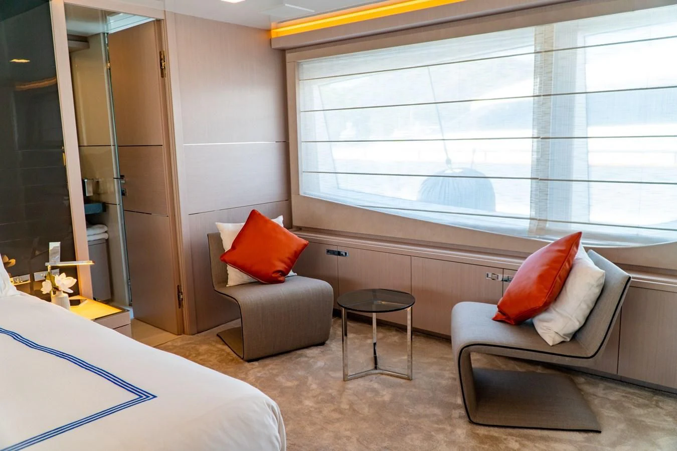 a room with a couch and a table aboard SHELLS X Yacht for Sale