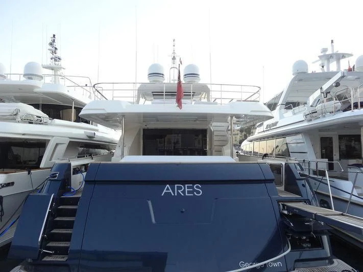 a boat docked at a pier aboard SHELLS X Yacht for Sale