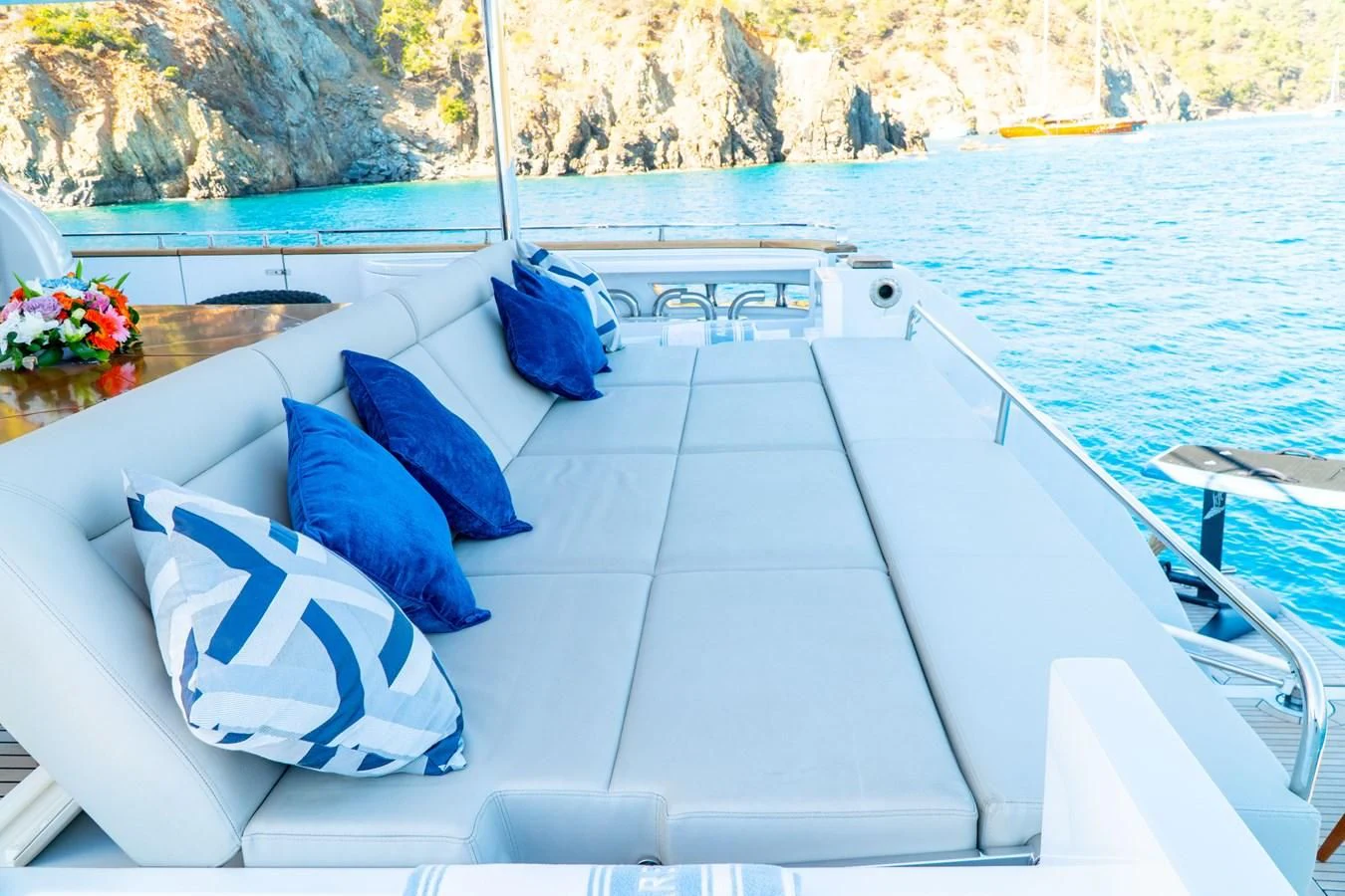 a boat with pillows on it aboard SHELLS X Yacht for Sale
