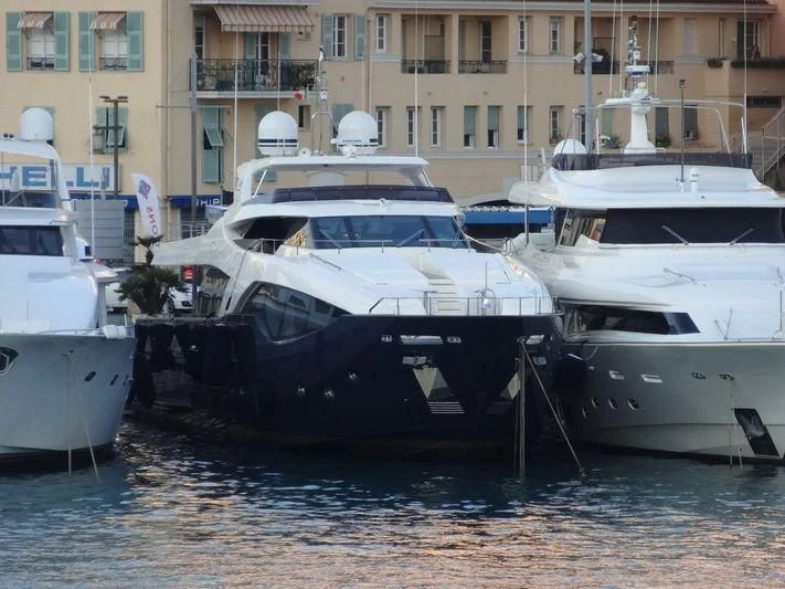 several boats docked in a harbor aboard SHELLS X Yacht for Sale