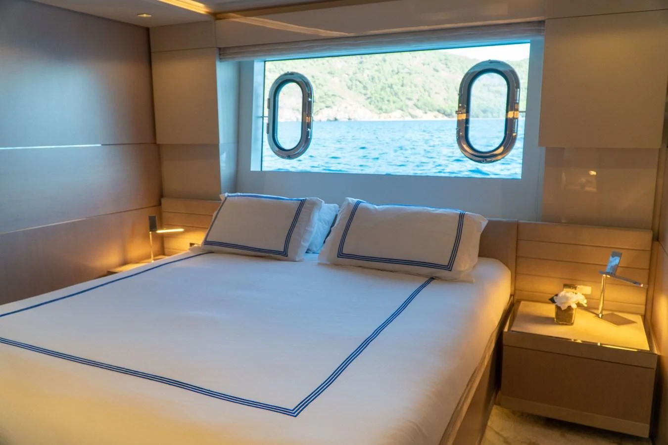 a room with a bed and a window aboard SHELLS X Yacht for Sale
