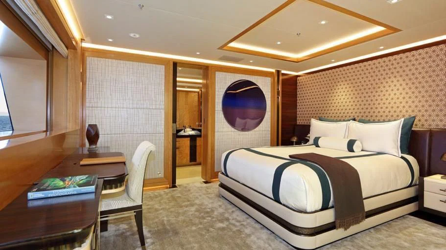 a large bedroom with a large bed aboard FORMOSA Yacht for Sale
