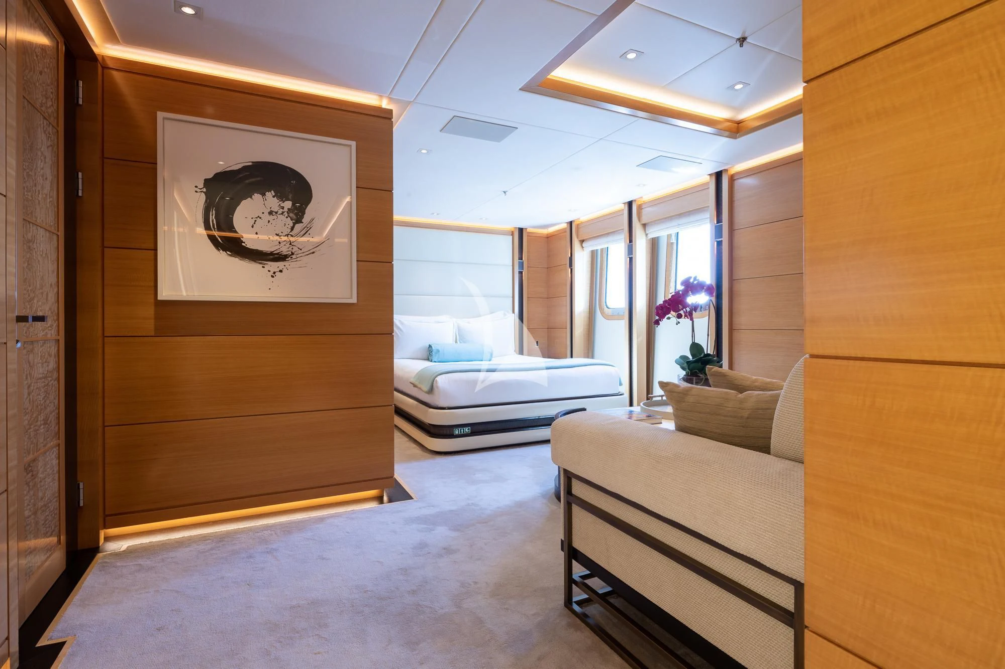 a room with a bed and a couch aboard FORMOSA Yacht for Sale