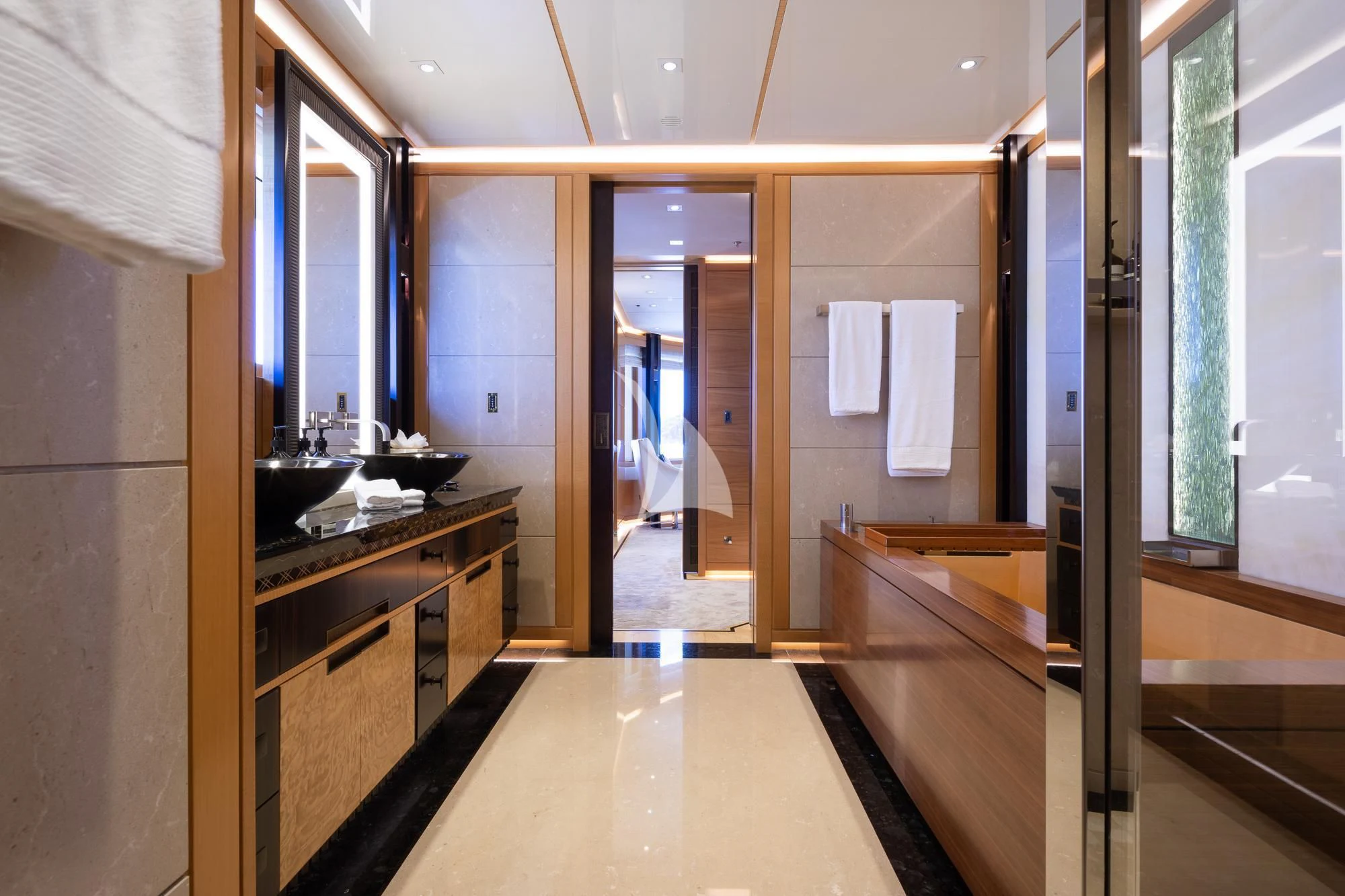 a bathroom with a large mirror aboard FORMOSA Yacht for Sale