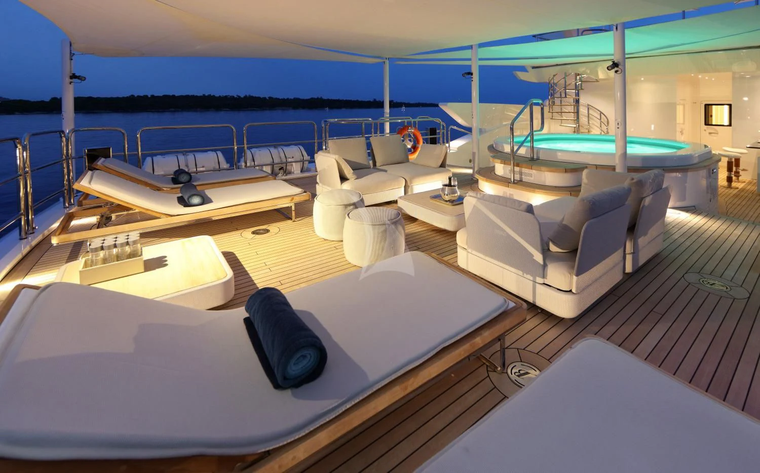 a room with a pool table and chairs aboard FORMOSA Yacht for Sale