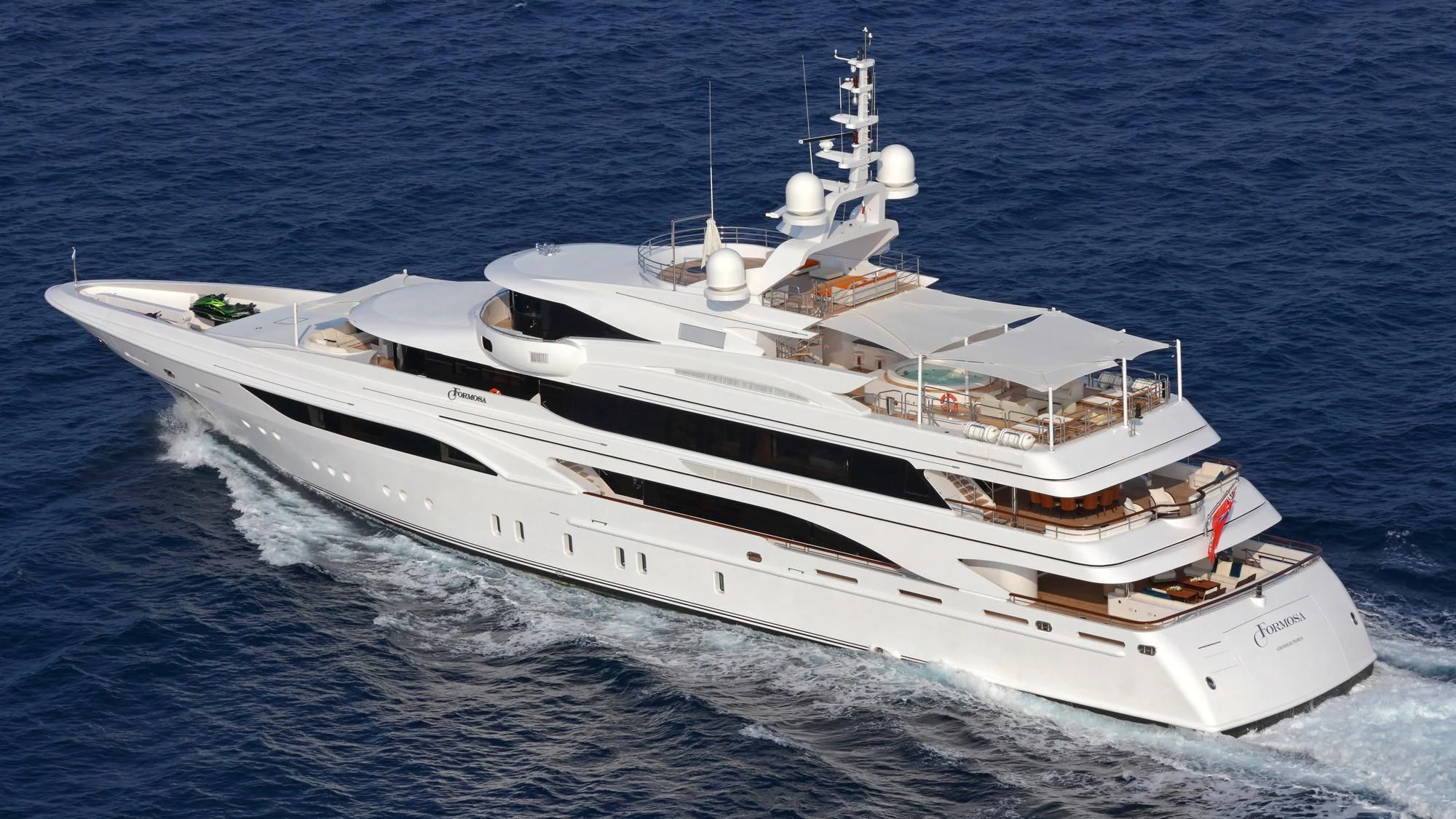 a white yacht in the water aboard FORMOSA Yacht for Sale