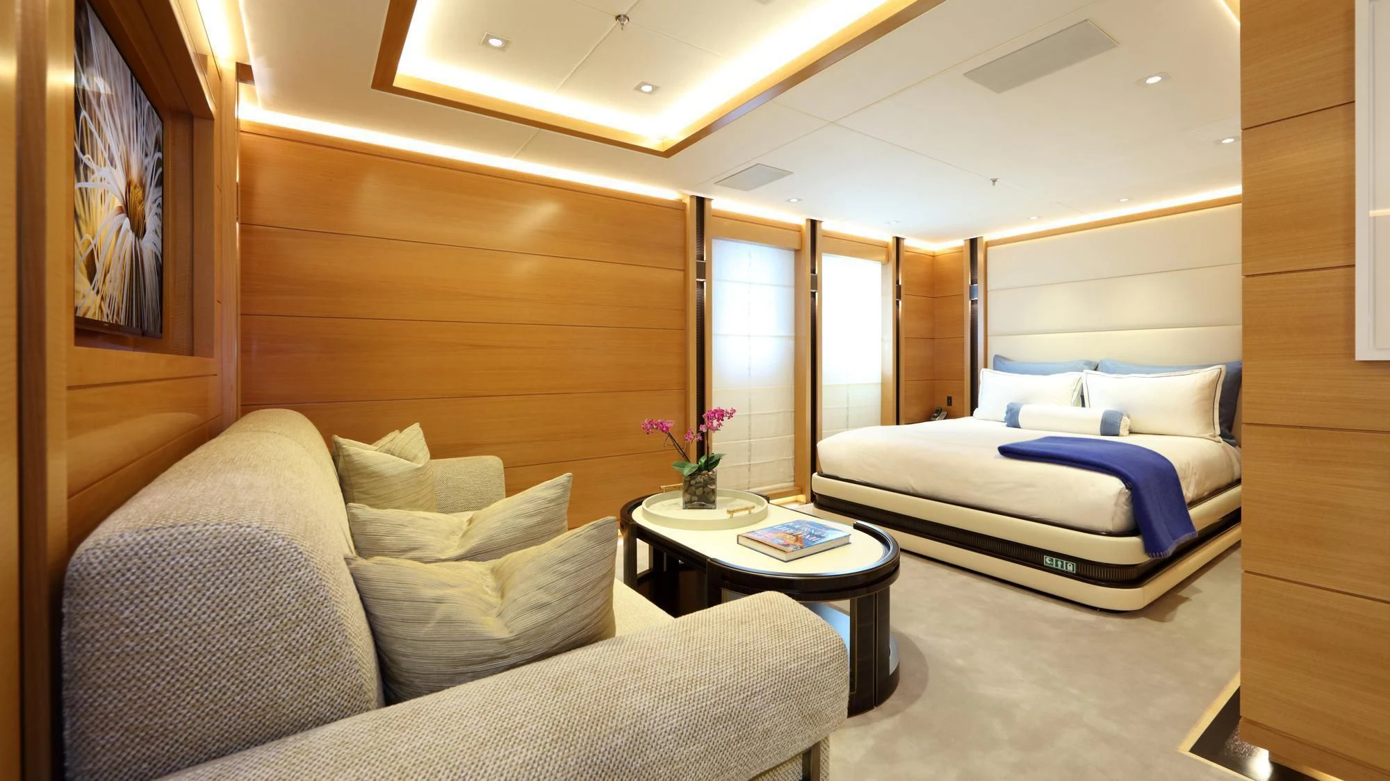 a room with a bed and a table aboard FORMOSA Yacht for Sale