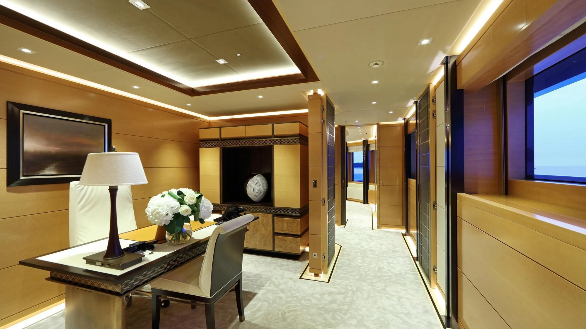 a room with a table and chairs aboard FORMOSA Yacht for Sale