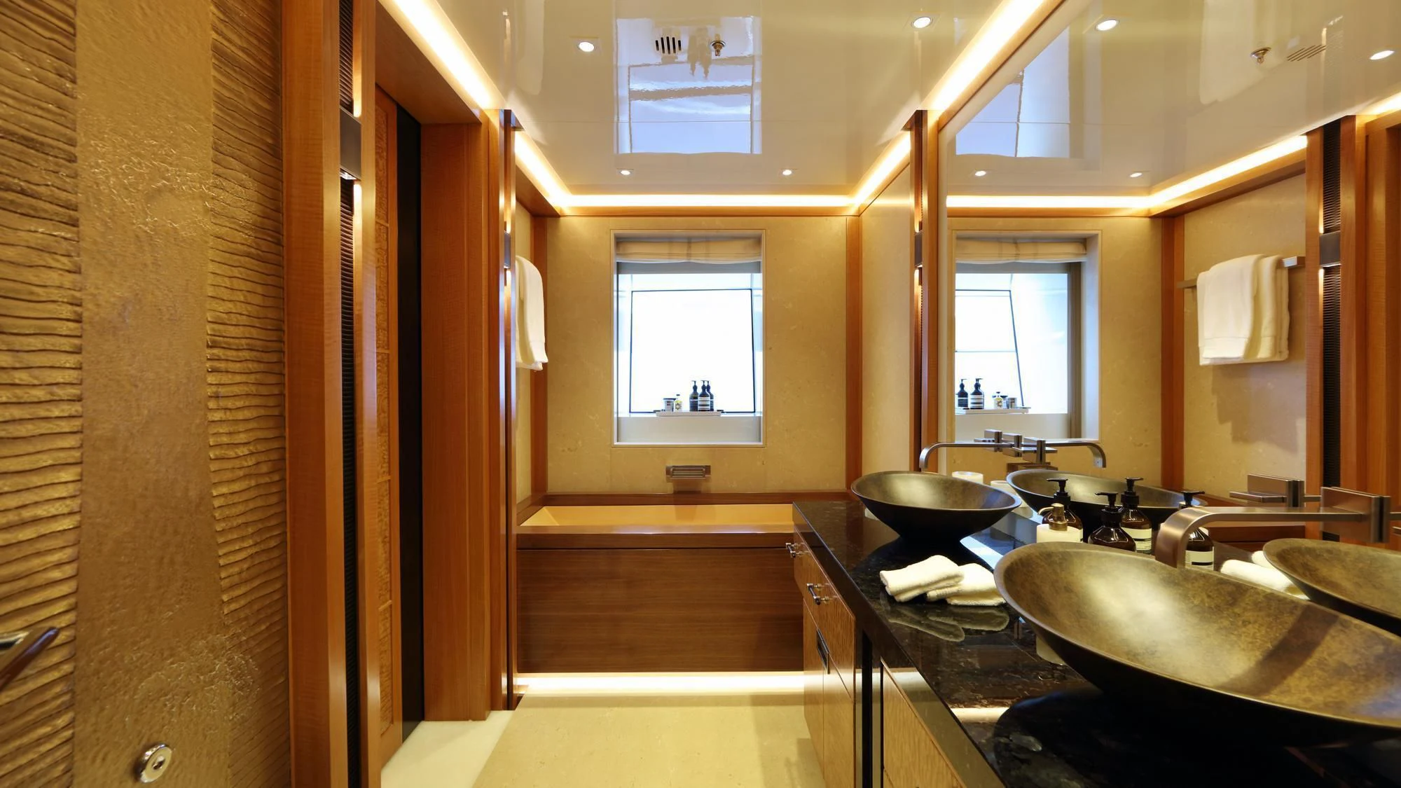a bathroom with sinks and mirrors aboard FORMOSA Yacht for Sale