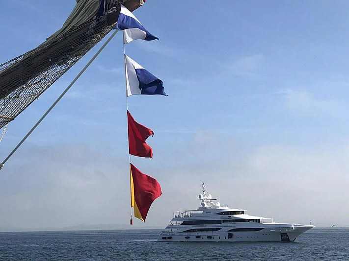 a boat with flags on it aboard FORMOSA Yacht for Sale
