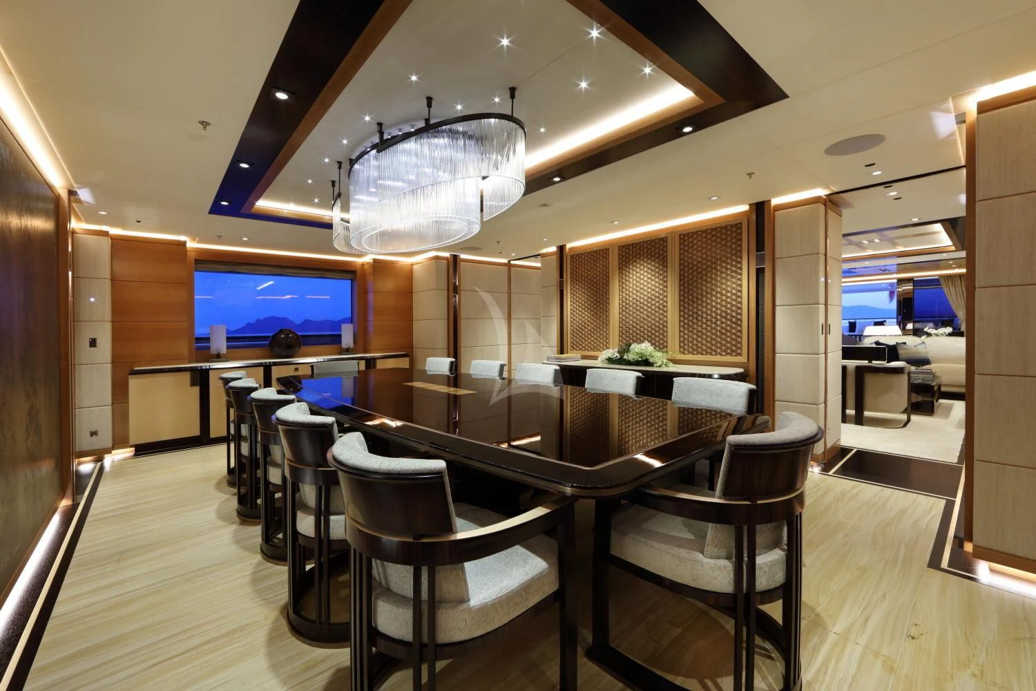 a room with a table and chairs aboard FORMOSA Yacht for Sale
