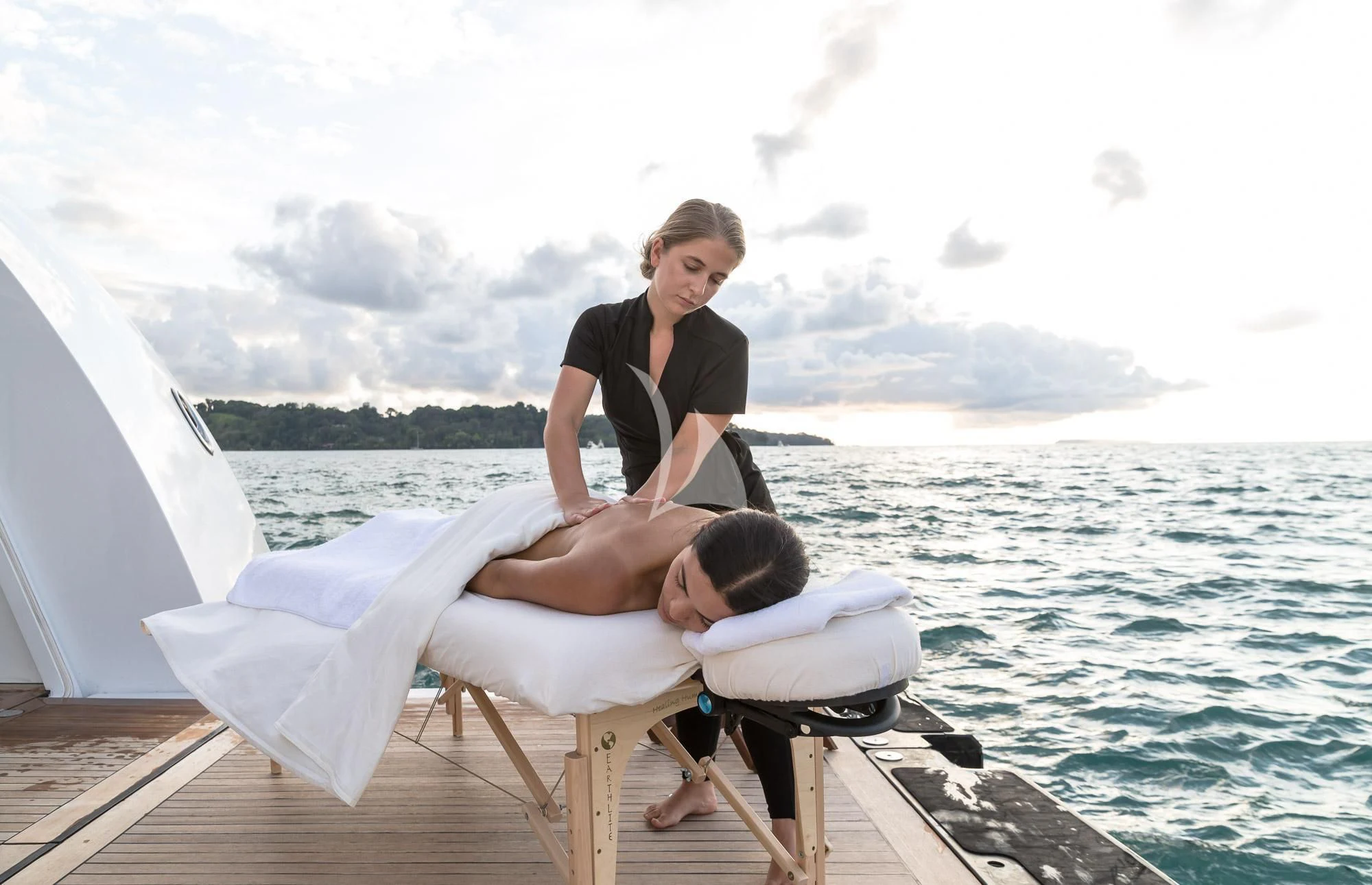 a person and a boy on a boat on the water aboard FORMOSA Yacht for Sale
