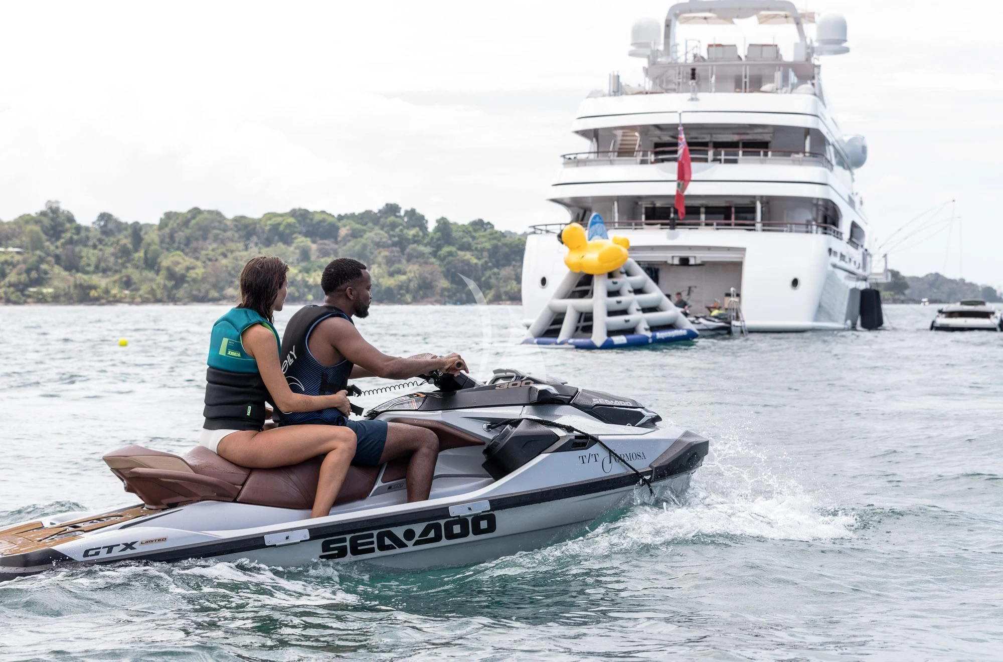 a couple of people in a boat in the water aboard FORMOSA Yacht for Sale
