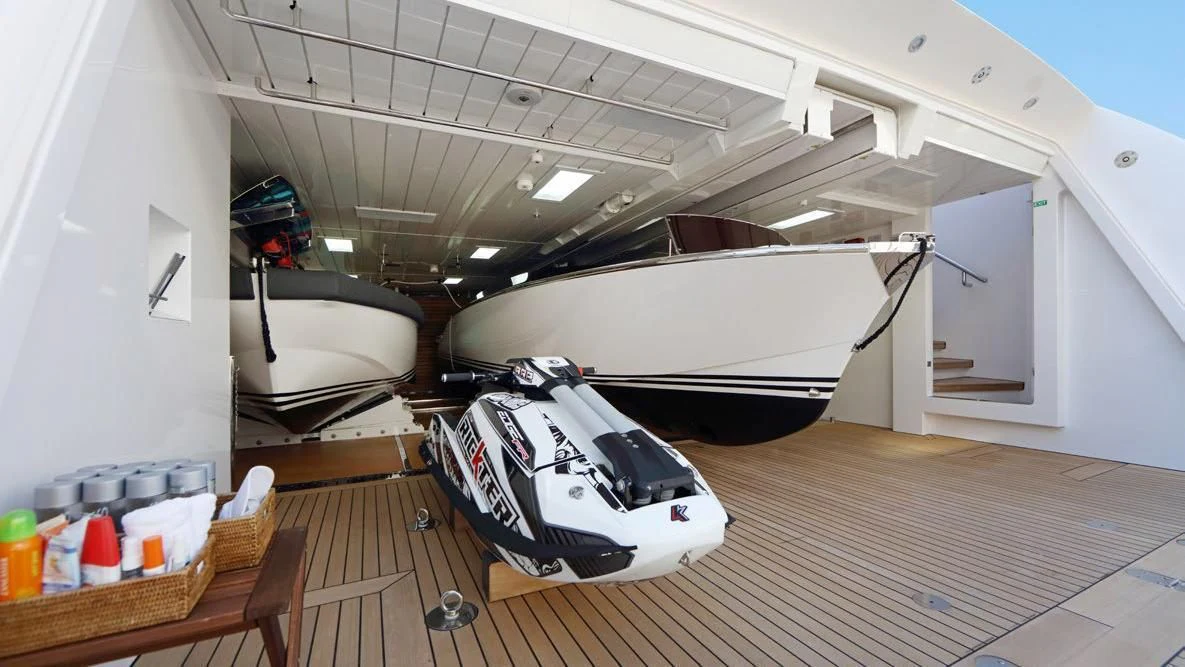 a room with a laptop and a table aboard FORMOSA Yacht for Sale