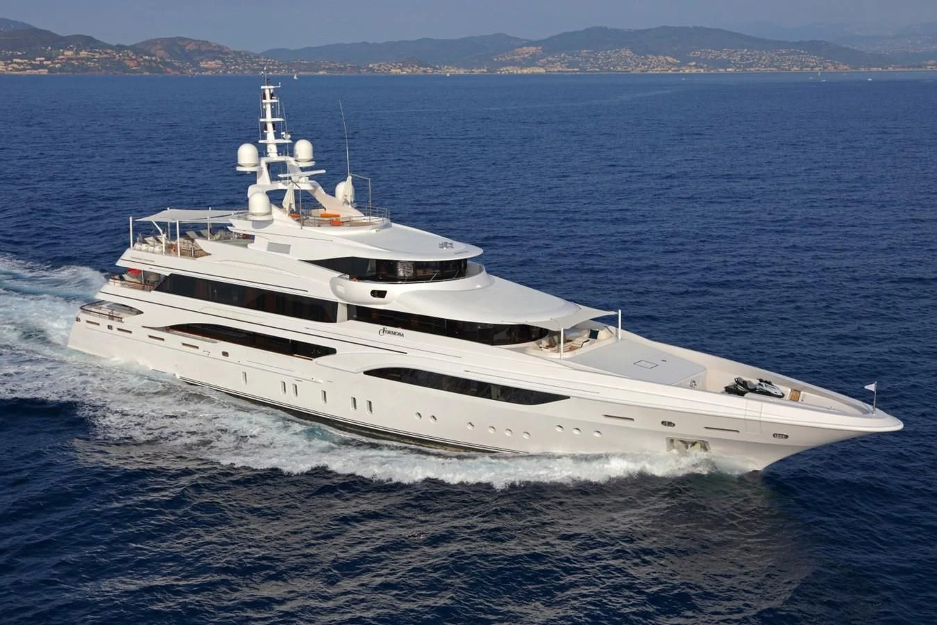 a white yacht in the water aboard FORMOSA Yacht for Sale