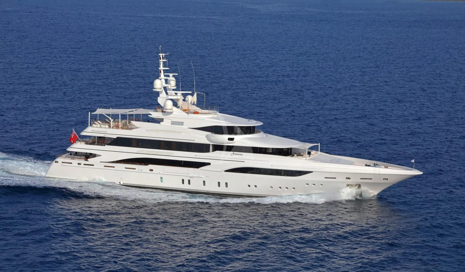 a white yacht in the water aboard FORMOSA Yacht for Sale
