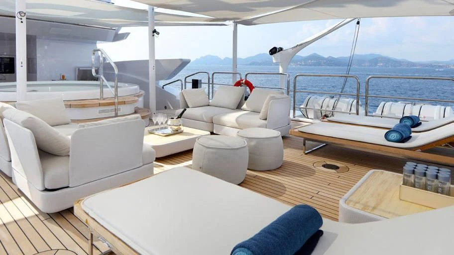 a boat with a table and chairs aboard FORMOSA Yacht for Sale
