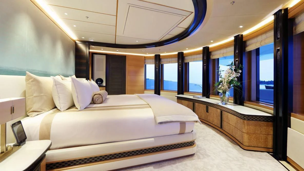 a room with a bed and a window aboard FORMOSA Yacht for Sale