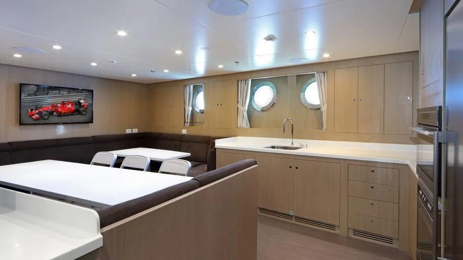 a room with a bed and a sink aboard FORMOSA Yacht for Sale