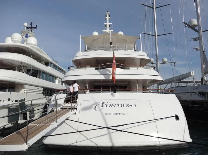 a couple of boats are parked in a harbor aboard FORMOSA Yacht for Sale