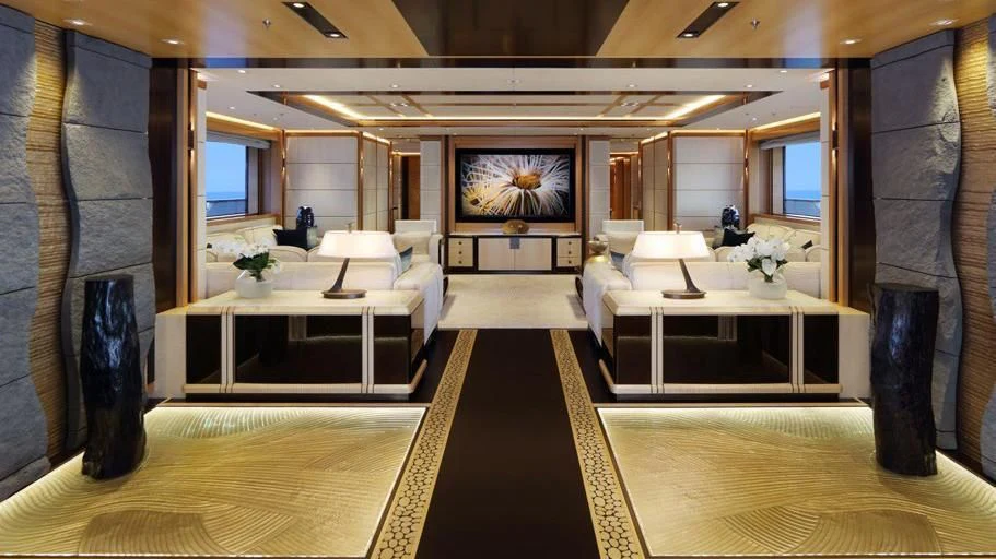 a large room with a table and chairs aboard FORMOSA Yacht for Sale