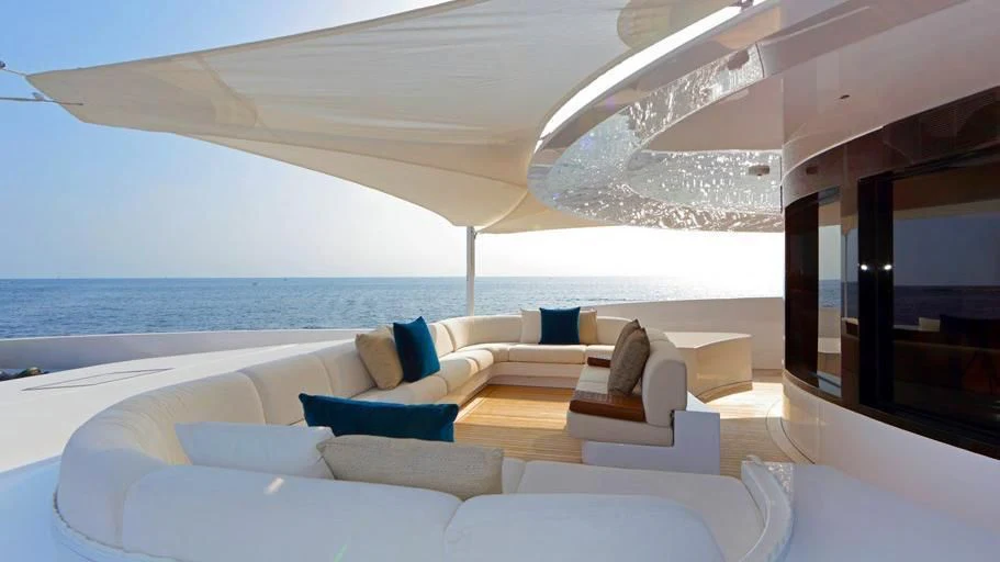 a modern looking living room with a large open window aboard FORMOSA Yacht for Sale