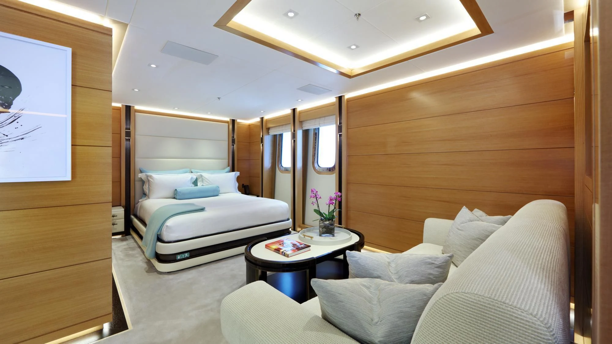 a room with a bed and a table aboard FORMOSA Yacht for Sale