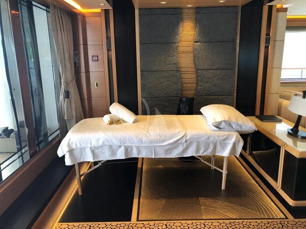 a room with a bed and a window aboard FORMOSA Yacht for Sale