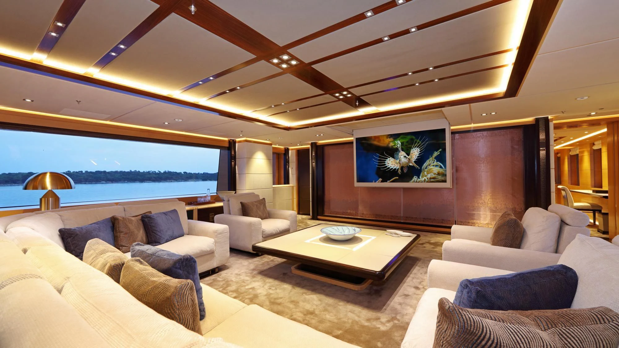 a living room with a large window aboard FORMOSA Yacht for Sale