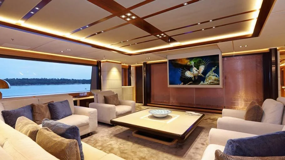 a living room with a large window aboard FORMOSA Yacht for Sale