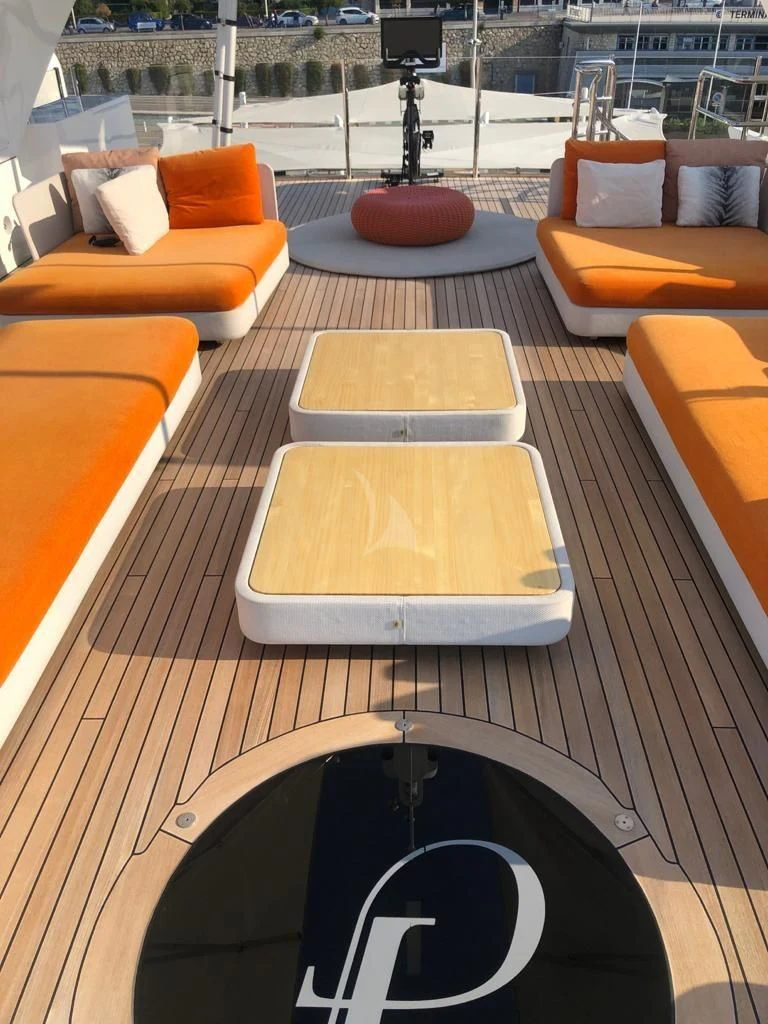 a room with a table and chairs aboard FORMOSA Yacht for Sale