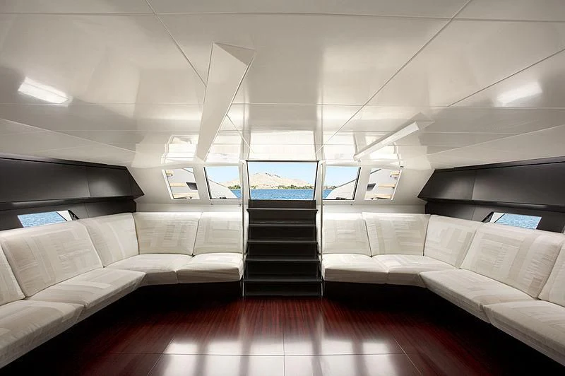 a room with couches and a staircase aboard ESENSE Yacht for Sale