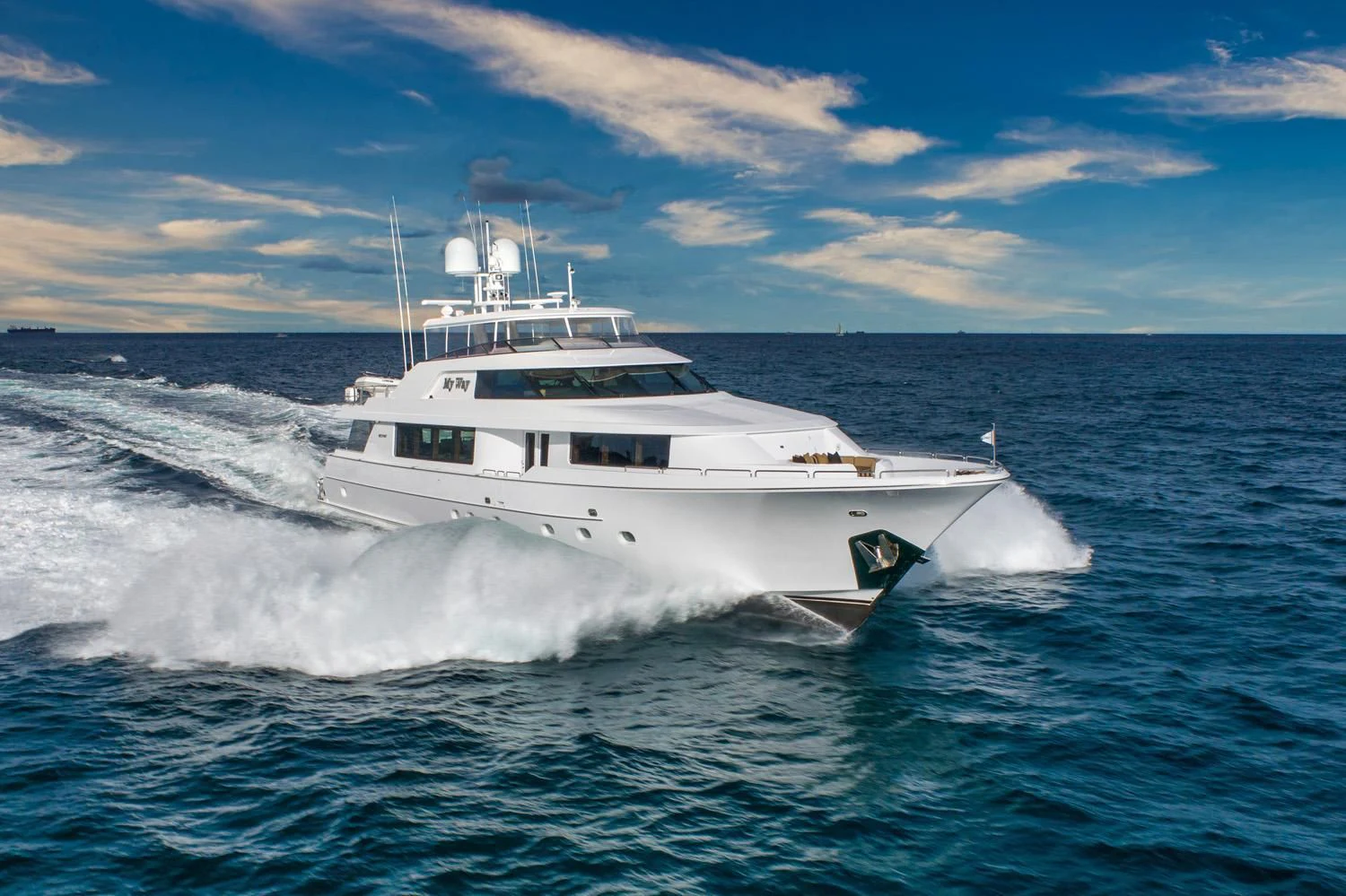 a white yacht in the water aboard ESENSE Yacht for Sale