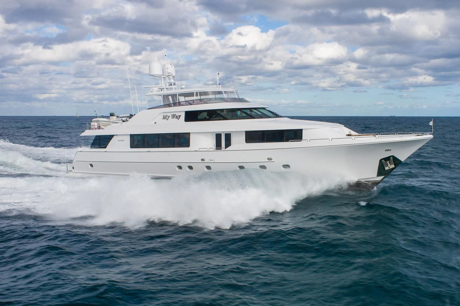 a white yacht in the water aboard ESENSE Yacht for Sale