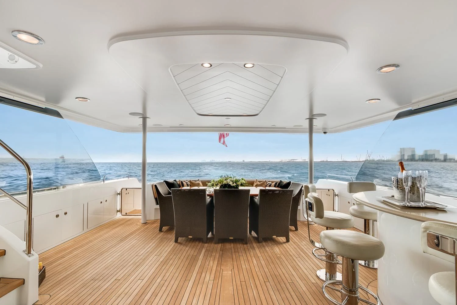 a room with a table and chairs aboard ESENSE Yacht for Sale