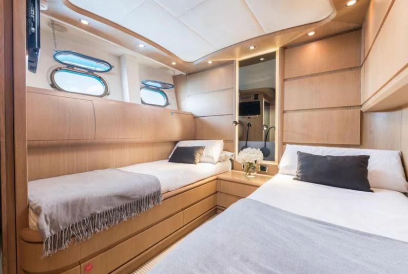 a room with two beds aboard B4 Yacht for Charter