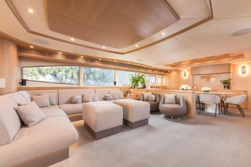 a living room with a large window aboard B4 Yacht for Charter