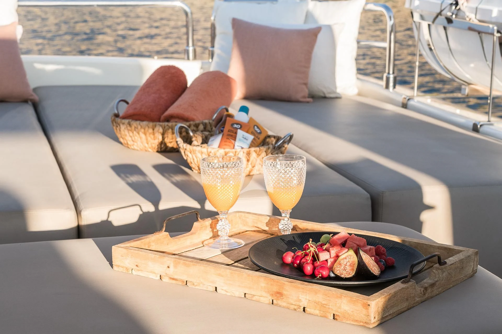 a table with food and drinks on it aboard B4 Yacht for Charter