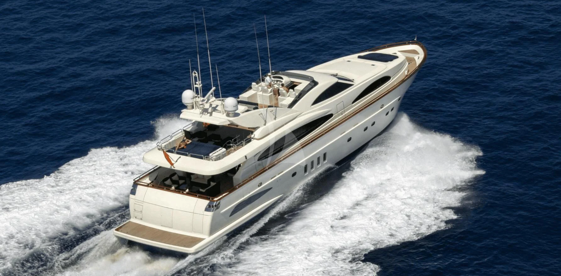 a white yacht on the water aboard B4 Yacht for Charter