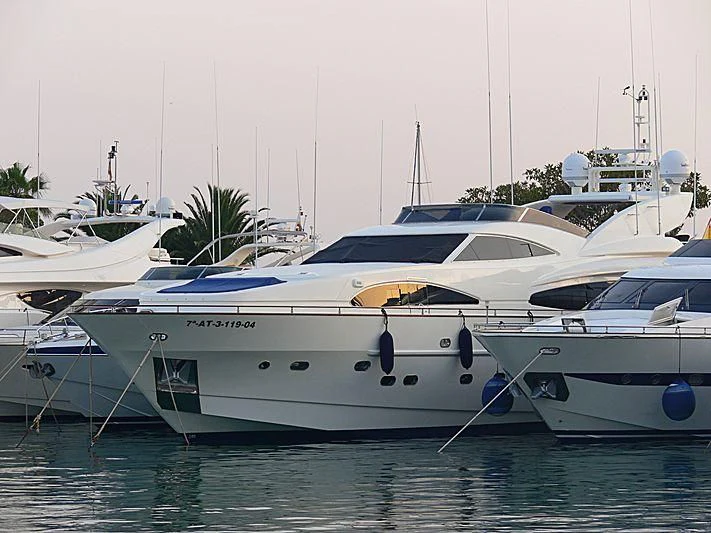 a group of boats in a harbor aboard B4 Yacht for Charter