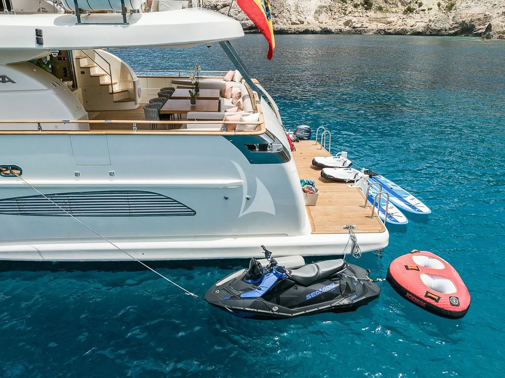 a boat with a red ball on the front aboard B4 Yacht for Charter
