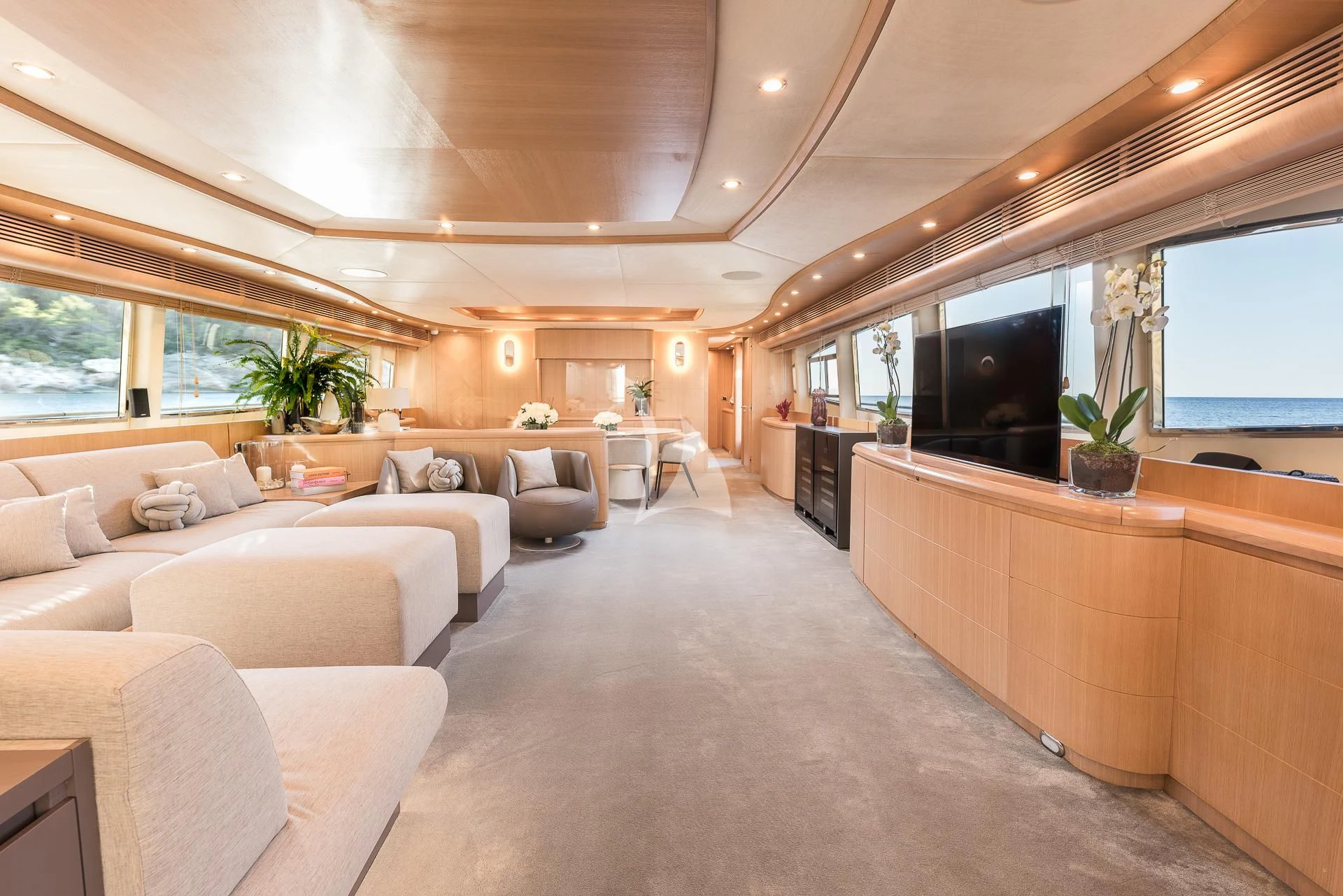 a large living room with a large open floor plan aboard B4 Yacht for Charter