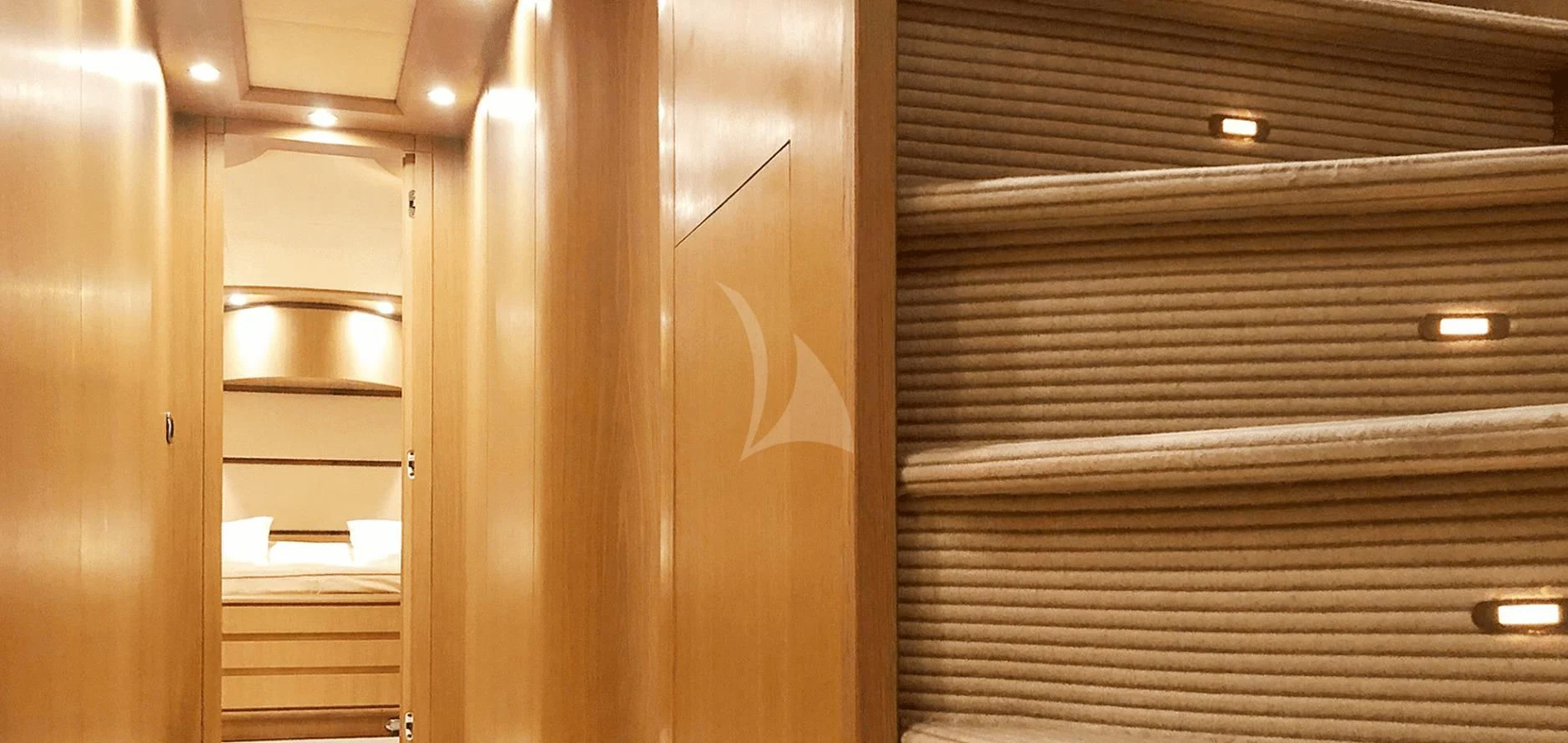 a closet with a shelf and a lamp aboard B4 Yacht for Charter