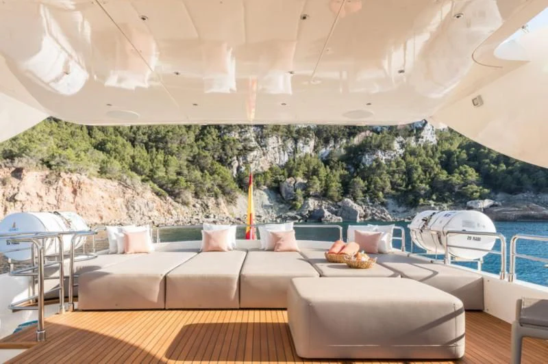 a room with a table and chairs aboard B4 Yacht for Charter