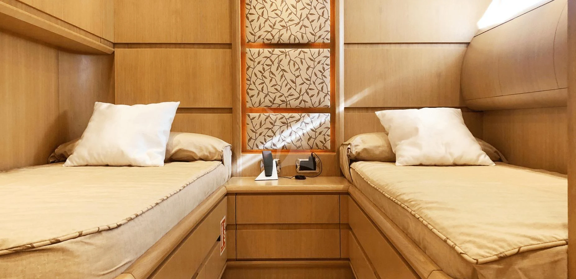 a room with two beds aboard B4 Yacht for Charter