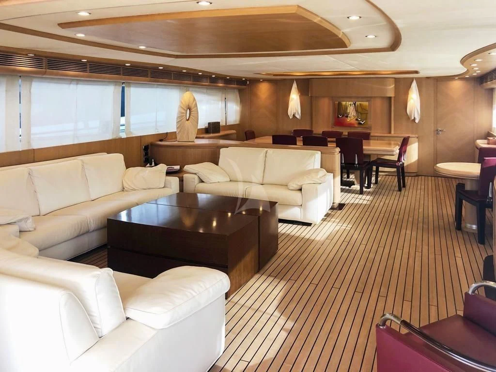 a large living room with a large window aboard B4 Yacht for Charter