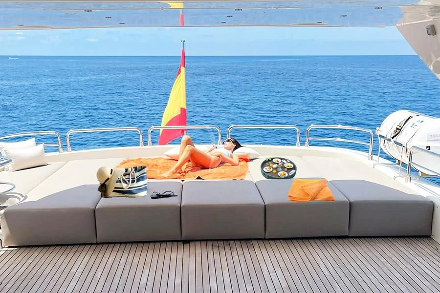 a boat with a sail on the water aboard B4 Yacht for Charter