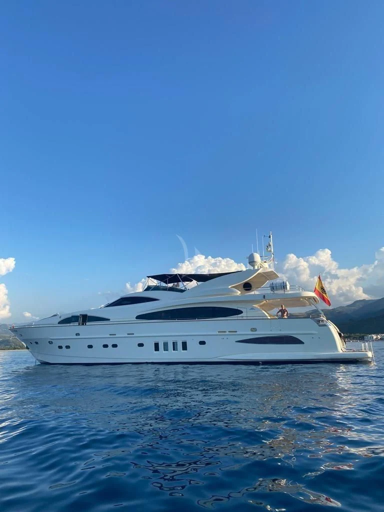 a white yacht in the water aboard B4 Yacht for Charter